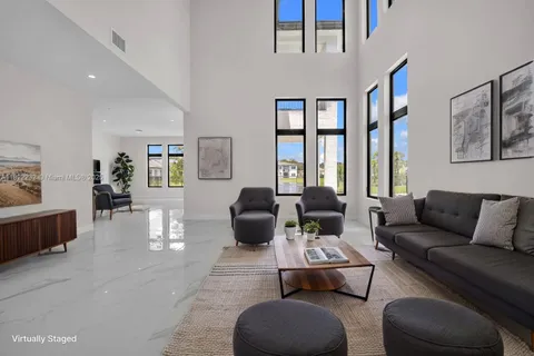 a living room with furniture or couch and a window