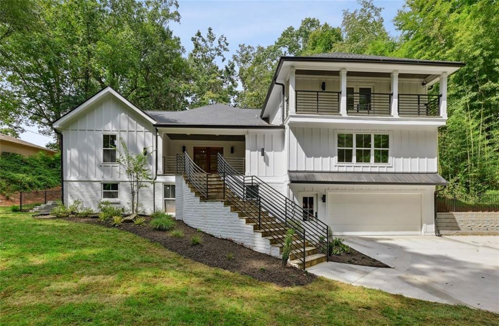 1066 McConnell Drive Decatur, GA 30033 - Photo 1 of 1 a front view of a house with a yard