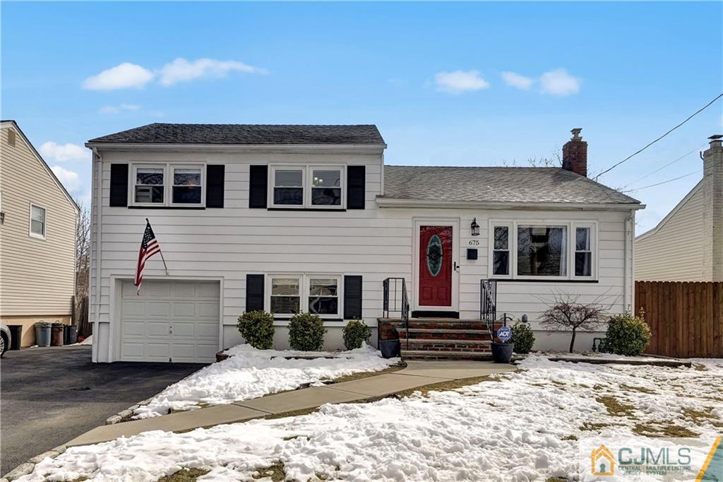 675 Colonial Arms Road Union, NJ 07083 - Photo 1 of 25 a front view of a house with a yard