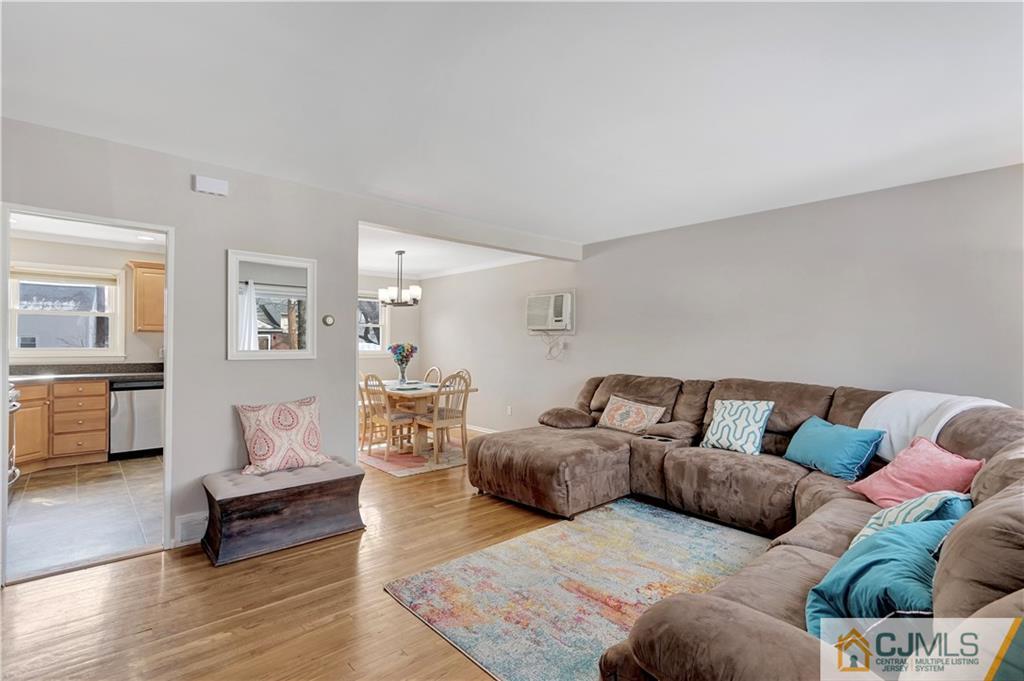 675 Colonial Arms Road Union, NJ 07083 - Photo 3 of 25 a living room with furniture and a couch