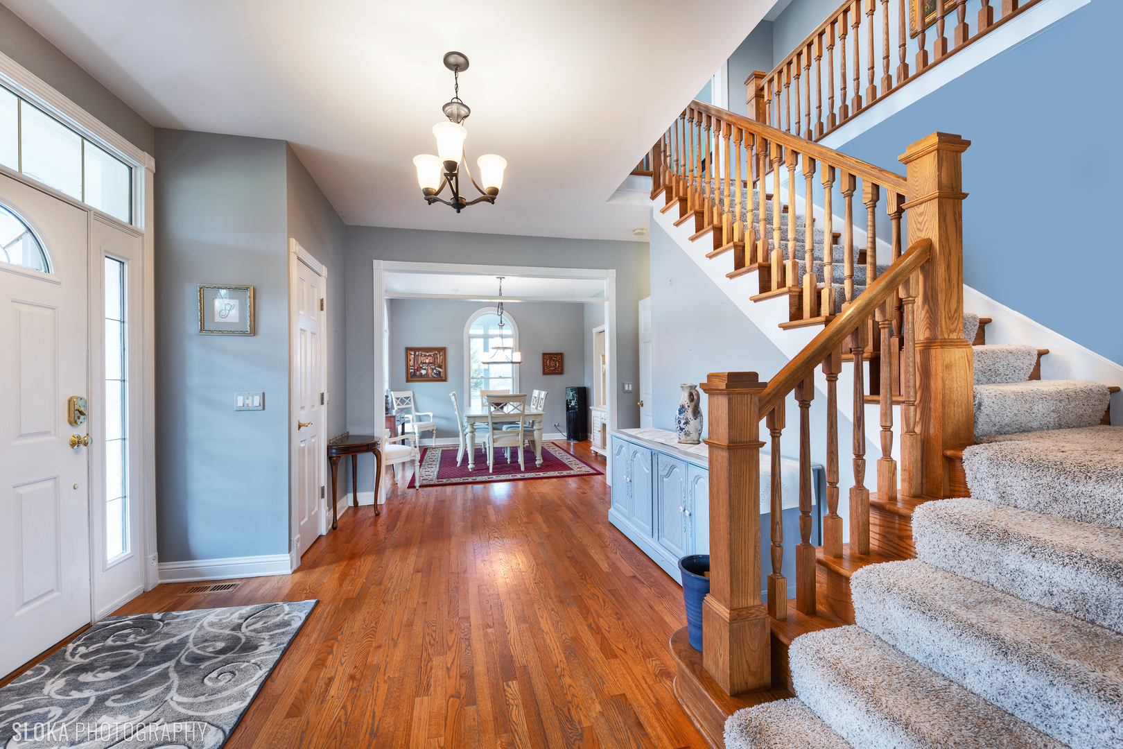 2908 Oak Ridge Road Crystal Lake, IL 60012 - Photo 5 of 53 a view of a livingroom with furniture and stairs