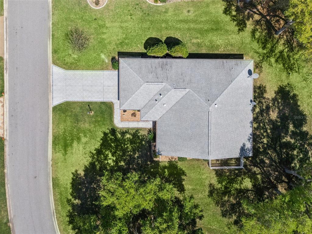 27217 Racquet Circle Leesburg, FL 34748 - Photo 37 of 90 an aerial view of a house