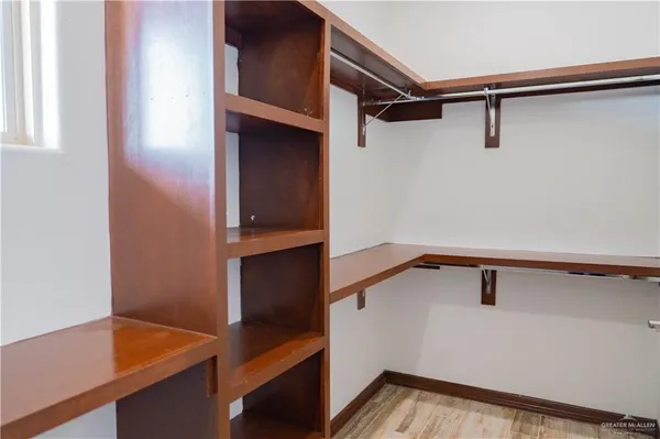 a view of small space with racks on the wall