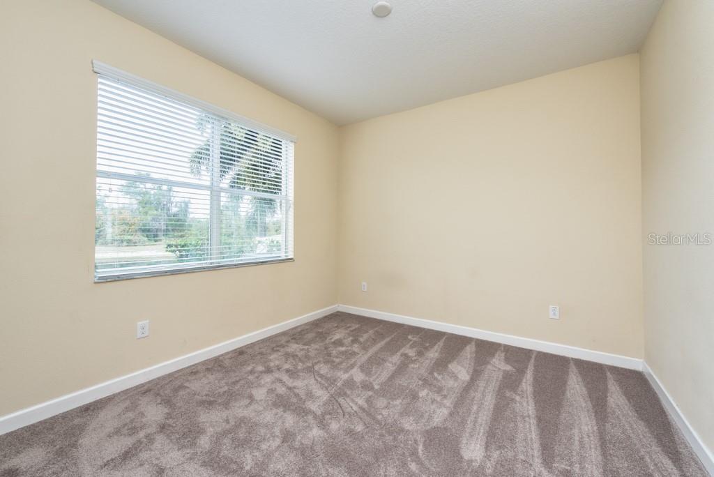 2409 Allegheny Valley Street Ruskin, FL 33570 - Photo 17 of 53 an empty room with a window