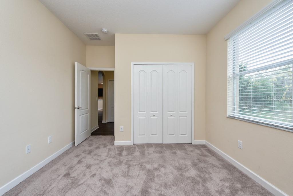 2409 Allegheny Valley Street Ruskin, FL 33570 - Photo 18 of 53 a view of an empty room with a window