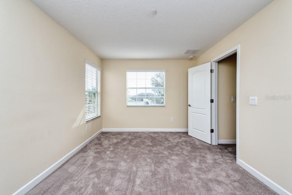 2409 Allegheny Valley Street Ruskin, FL 33570 - Photo 27 of 53 an empty room with windows and closet