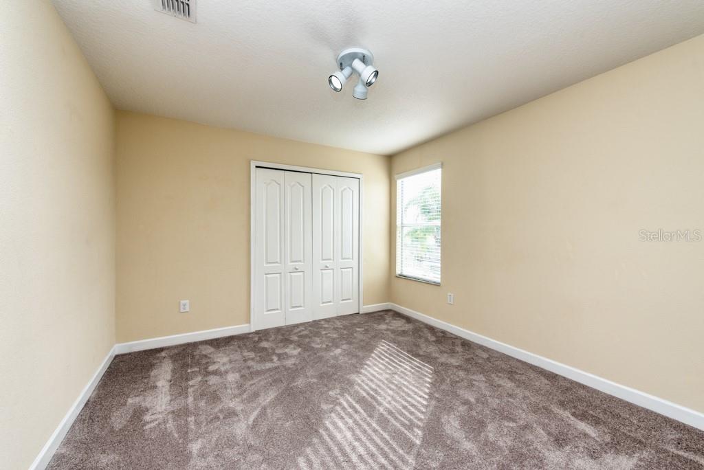 2409 Allegheny Valley Street Ruskin, FL 33570 - Photo 31 of 53 a view of an empty room and a window