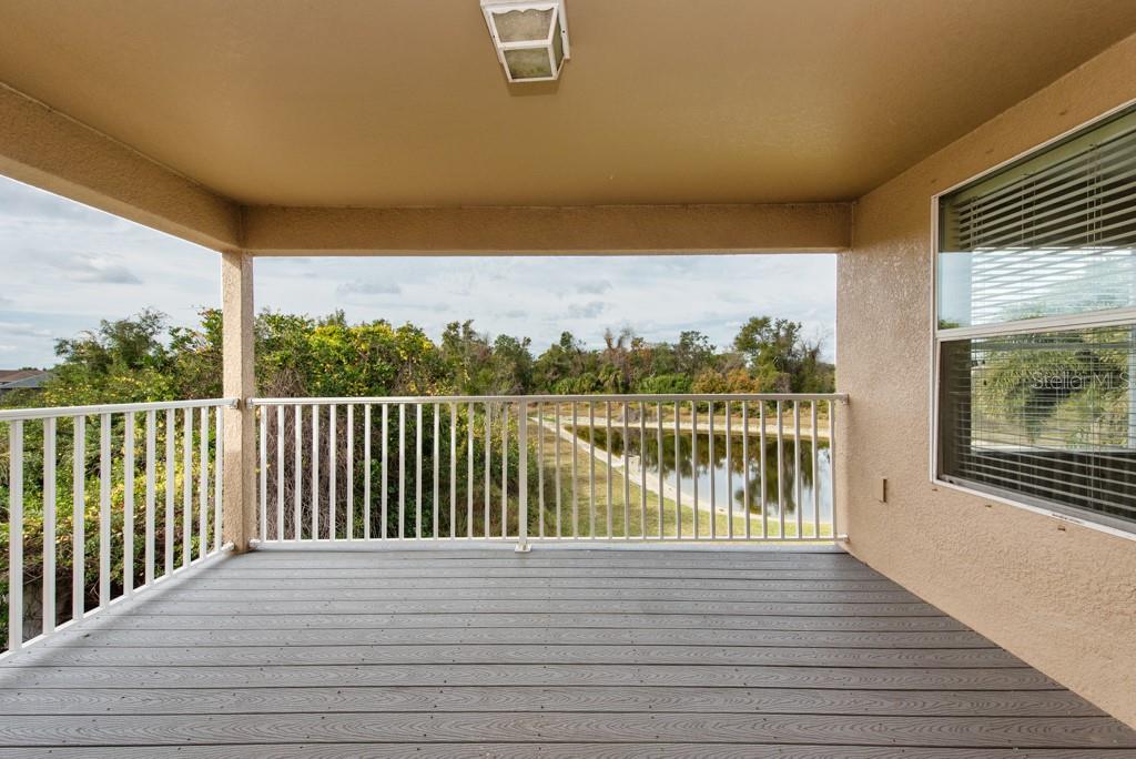 2409 Allegheny Valley Street Ruskin, FL 33570 - Photo 36 of 53 a view of a balcony with lake view and mountain view