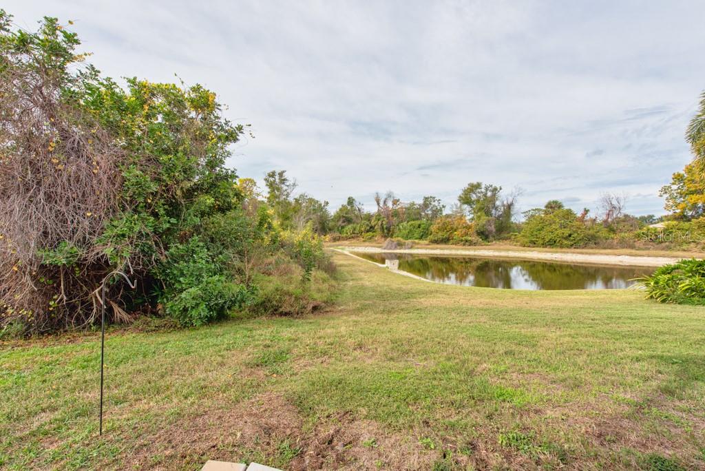 2409 Allegheny Valley Street Ruskin, FL 33570 - Photo 42 of 53 a view of a lake with houses in the back
