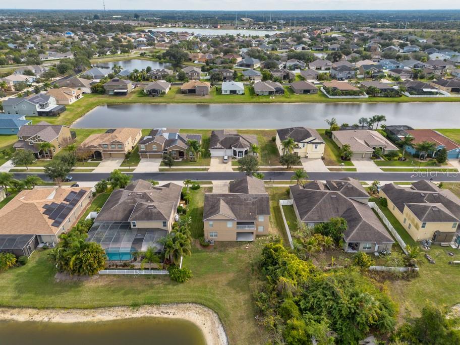2409 Allegheny Valley Street Ruskin, FL 33570 - Photo 51 of 53 an aerial view of residential houses with outdoor space and lake view