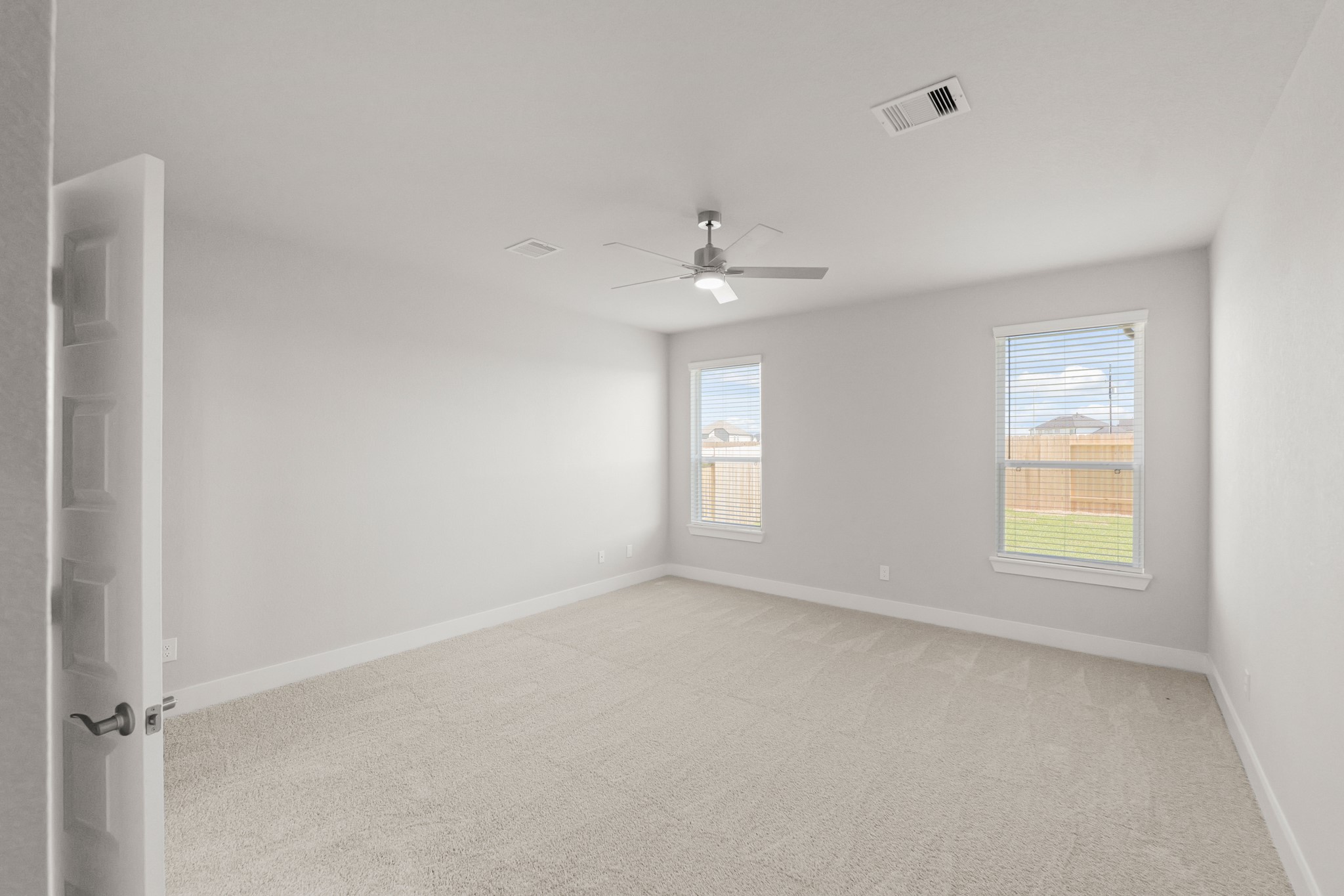 4603 Whisperwood Drive Rosenberg, TX 77471 - Photo 19 of 50 an empty room with windows and closet