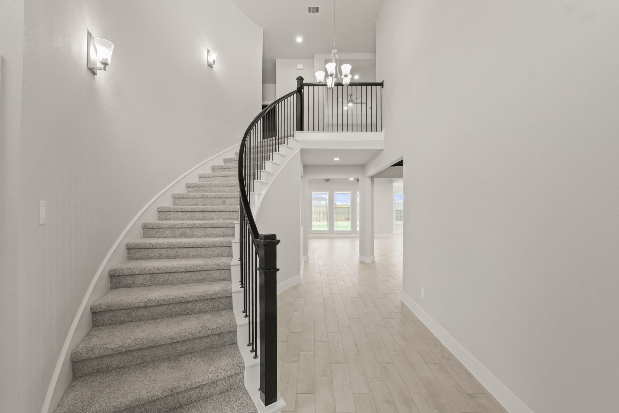 4603 Whisperwood Drive Rosenberg, TX 77471 - Photo 2 of 50 a view of entryway and hall with wooden floor