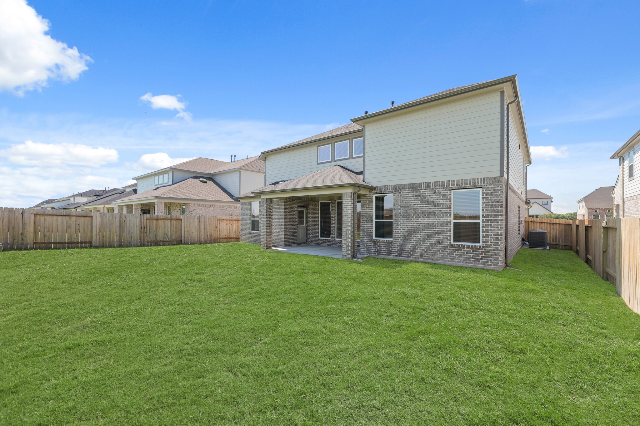 4603 Whisperwood Drive Rosenberg, TX 77471 - Photo 44 of 50 a view of a house with a back yard