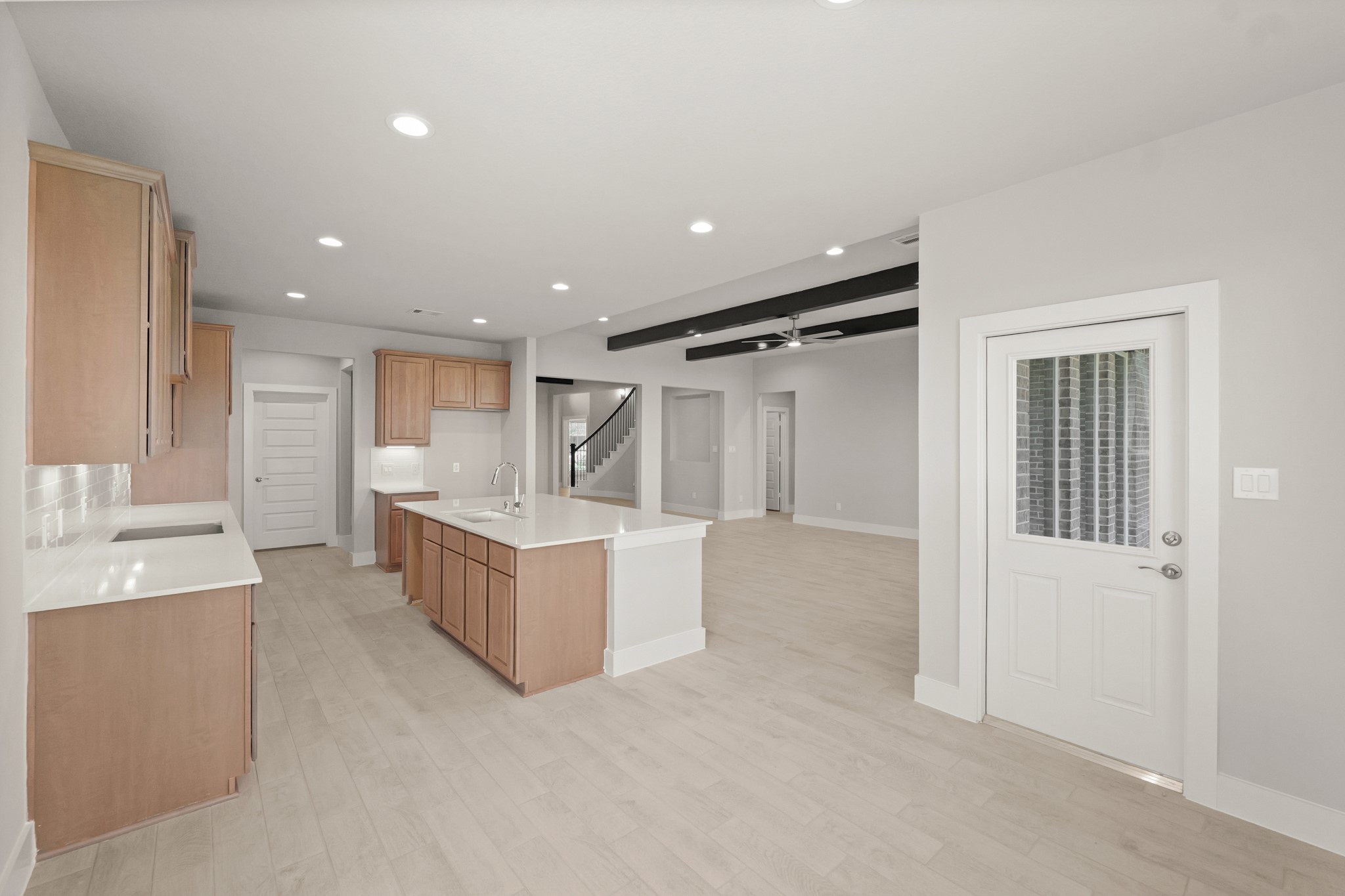 4603 Whisperwood Drive Rosenberg, TX 77471 - Photo 8 of 50 a large white kitchen with a large window