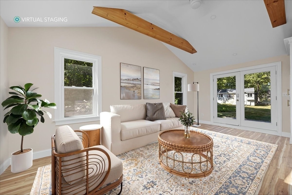 198 Hull Street Hingham, MA 02043 - Photo 1 of 15 a living room with furniture potted plant and a table