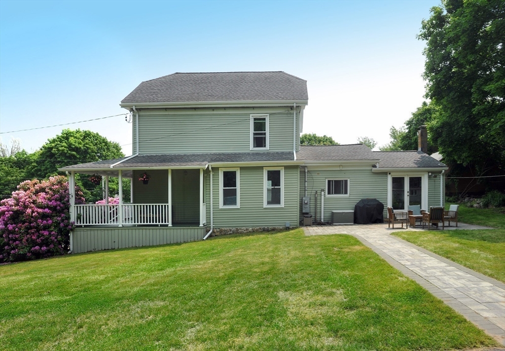 198 Hull Street Hingham, MA 02043 - Photo 13 of 15 a front view of a house with a yard