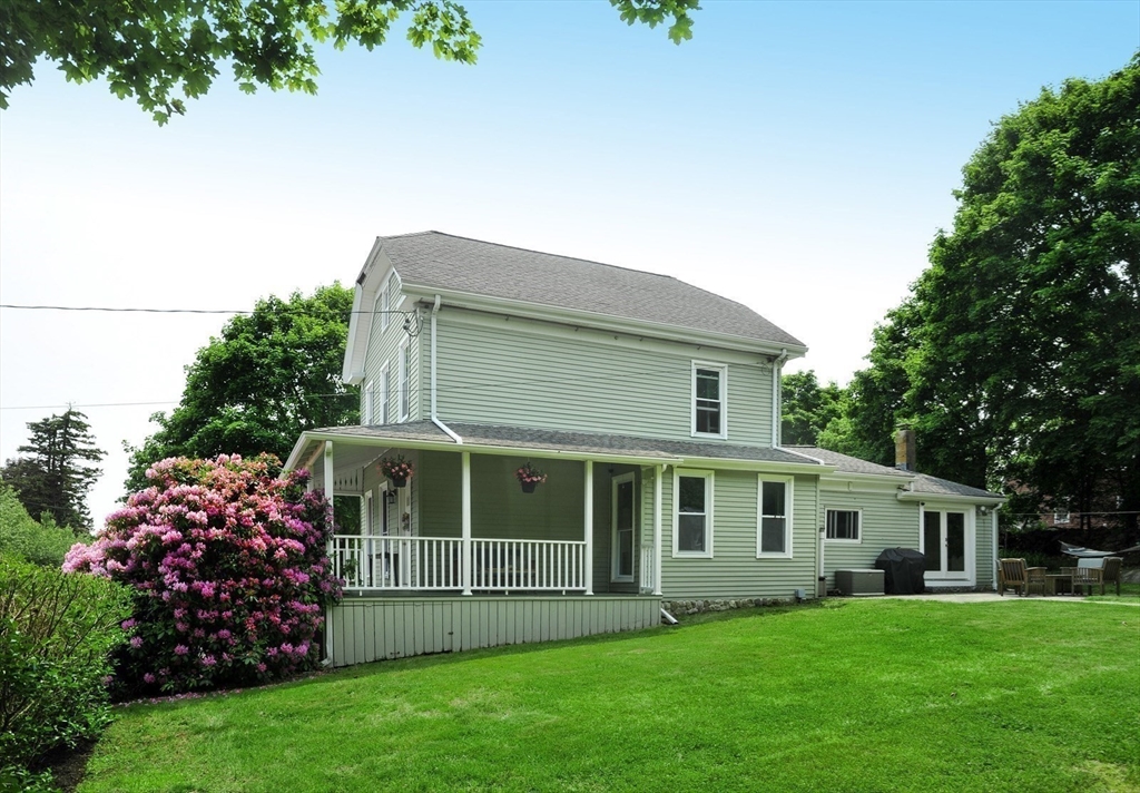 198 Hull Street Hingham, MA 02043 - Photo 14 of 15 a view of a house with a yard