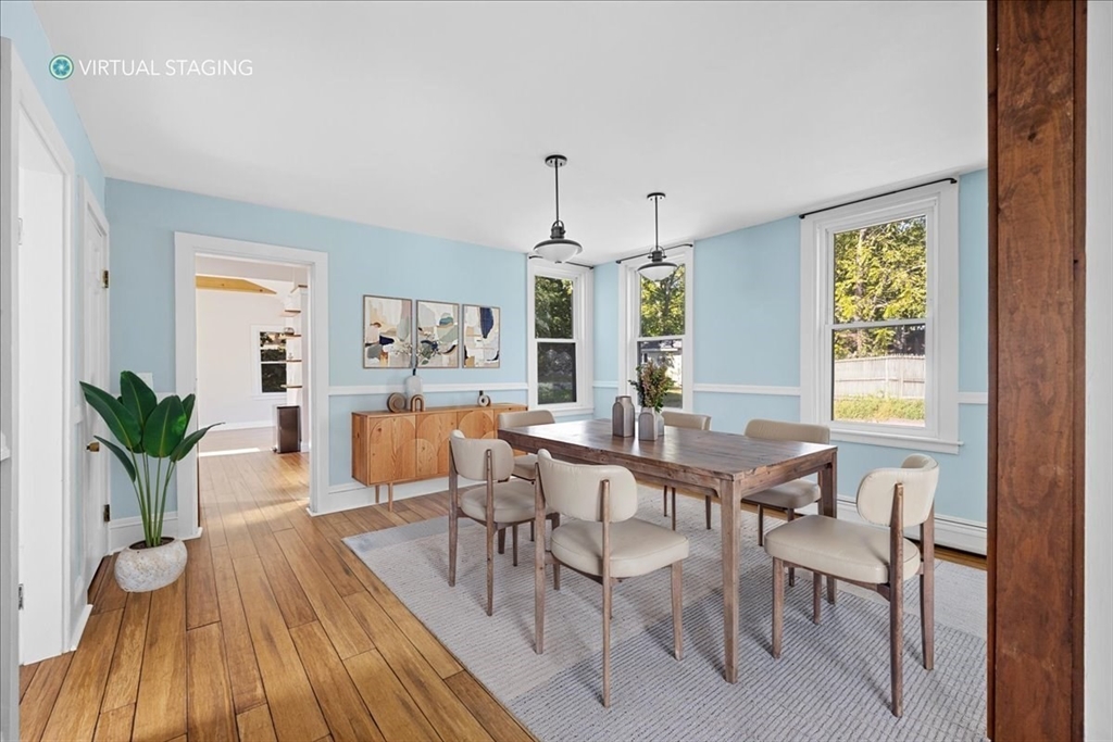 198 Hull Street Hingham, MA 02043 - Photo 4 of 15 a view of a dining room with furniture window and wooden floor