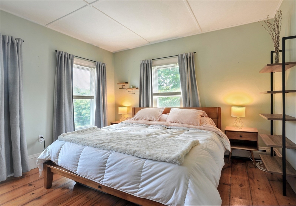 198 Hull Street Hingham, MA 02043 - Photo 7 of 15 a bedroom with a bed and a window