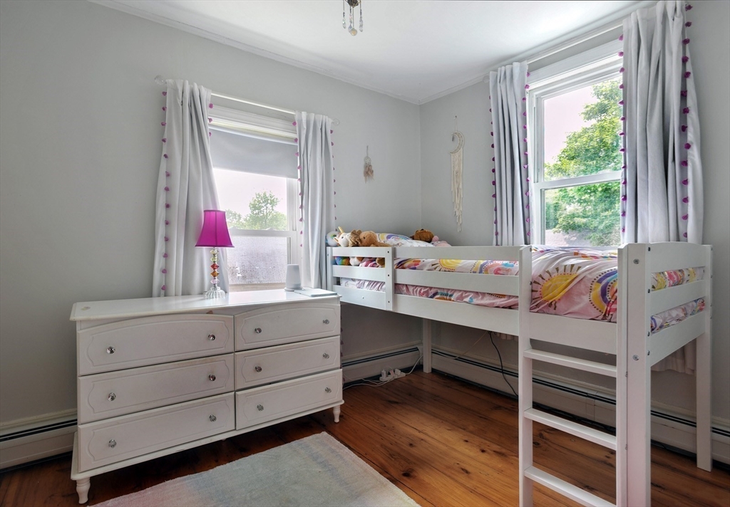 198 Hull Street Hingham, MA 02043 - Photo 8 of 15 a room with a bed and a window