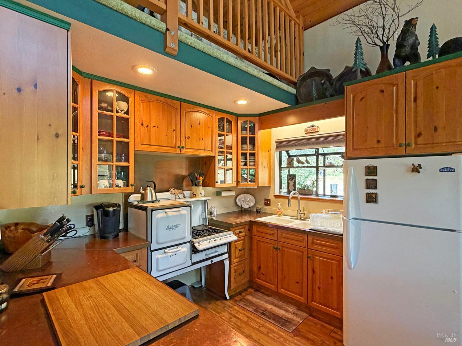 31312 High Point Road Potter Valley, CA 95469 - Photo 14 of 58 a kitchen with a sink appliances and cabinets