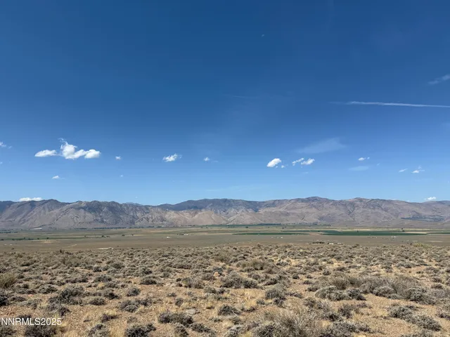 a view of lake and mountain
