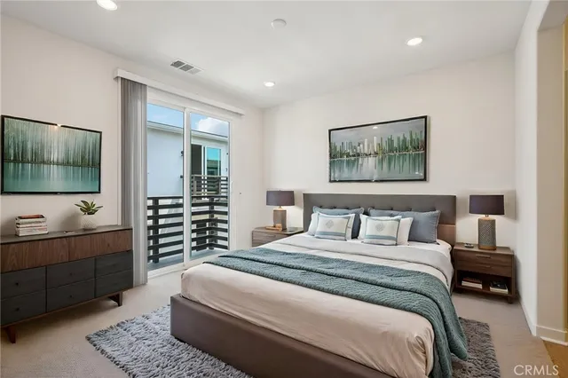 an empty room with closet and mirror