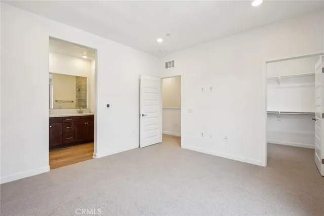 a view of an empty walk in closet