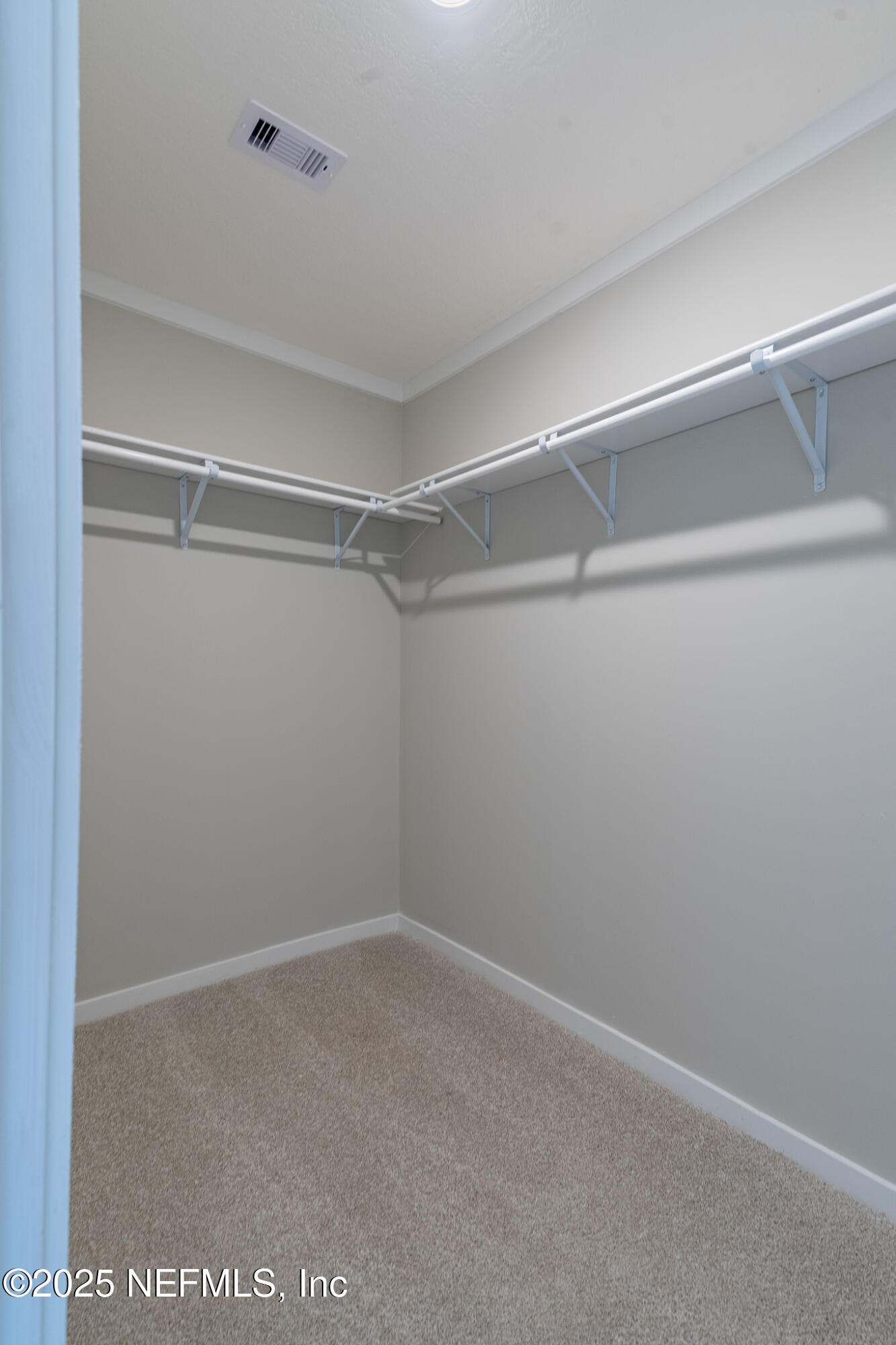 54405 Lee Stoner Road East Callahan, FL 32011 - Photo 14 of 24 a view of an empty walk in closet