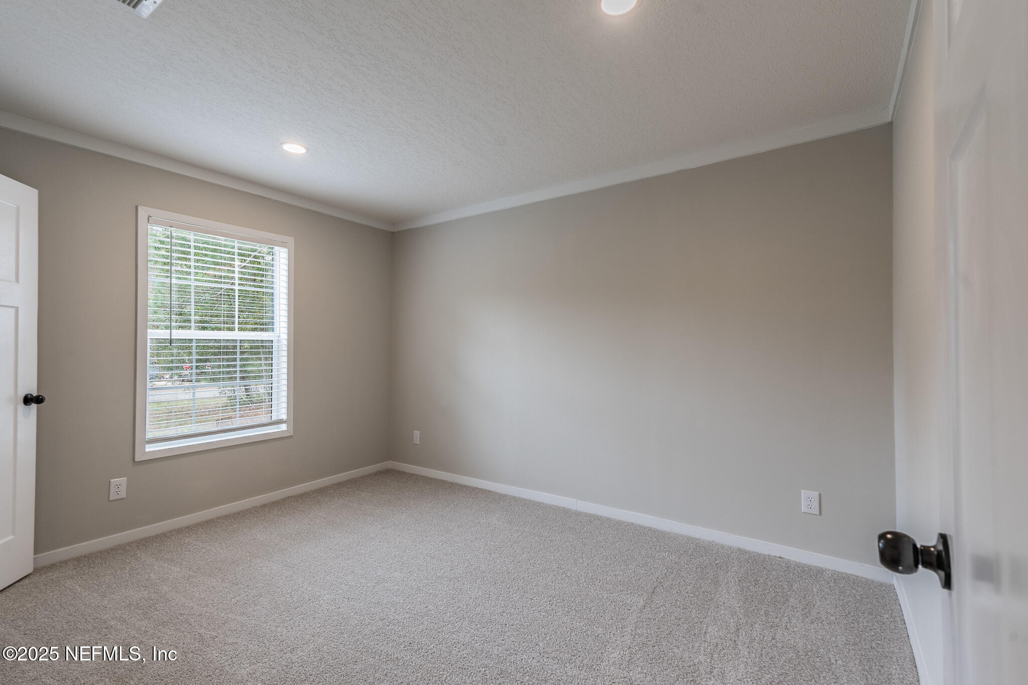 54405 Lee Stoner Road East Callahan, FL 32011 - Photo 18 of 24 an empty room with a window