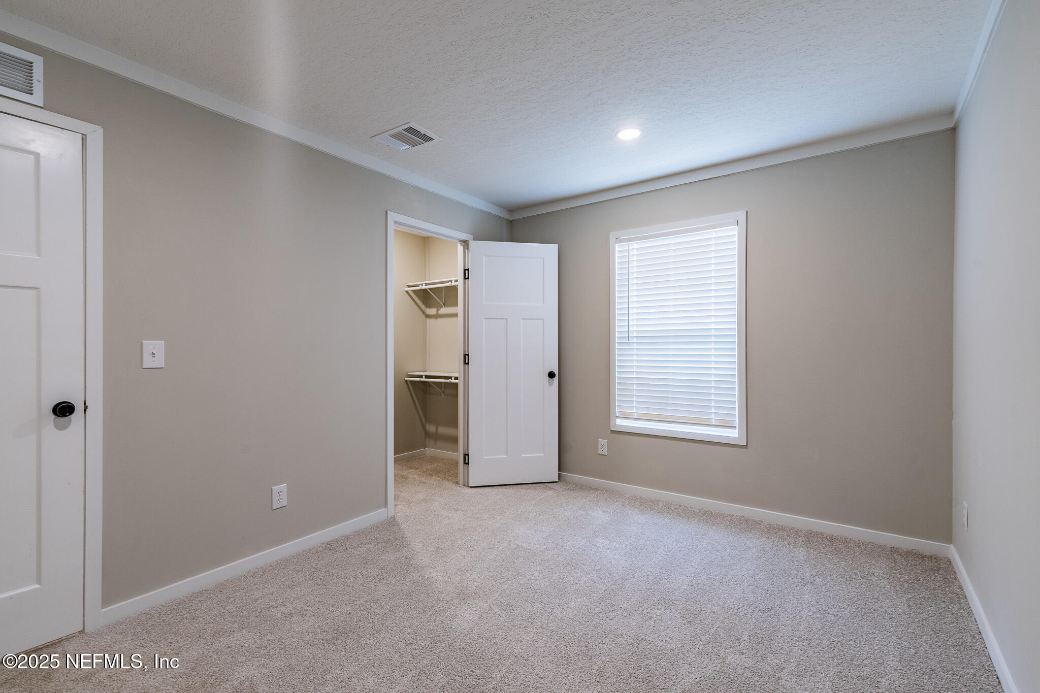 54405 Lee Stoner Road East Callahan, FL 32011 - Photo 19 of 24 an empty room with windows