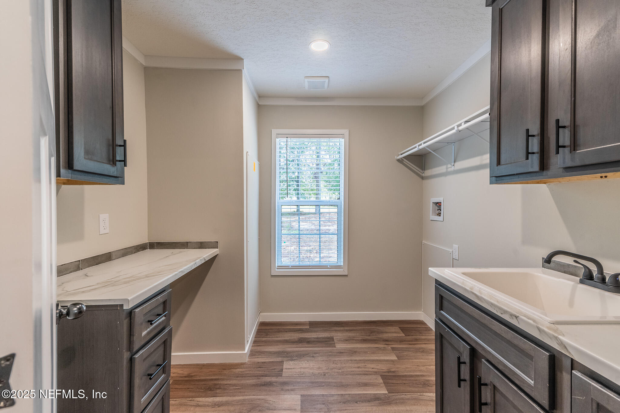 54405 Lee Stoner Road East Callahan, FL 32011 - Photo 20 of 24 a view of a kitchen cabinets and empty room