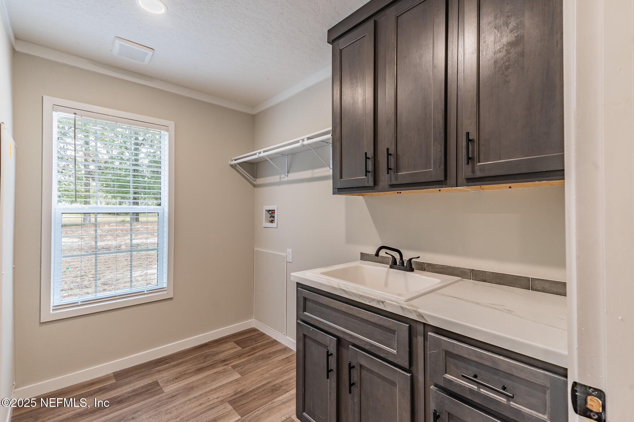 54405 Lee Stoner Road East Callahan, FL 32011 - Photo 21 of 24 a view of a kitchen with electric appliances