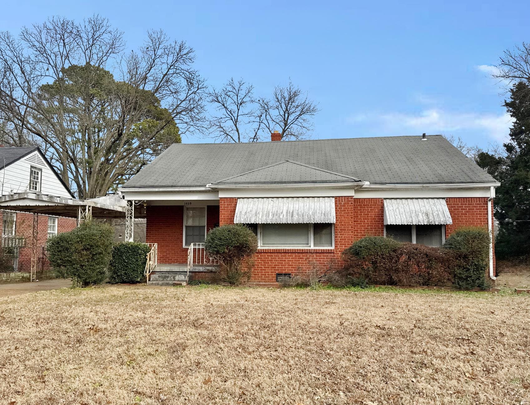 1454 Railton Road Memphis, TN 38111 - Photo 1 of 10 a front view of house with trees around