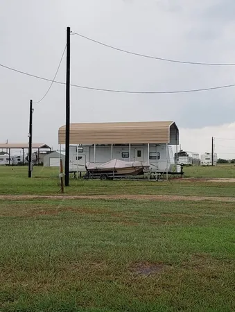 a aerial view of a house with a big yard