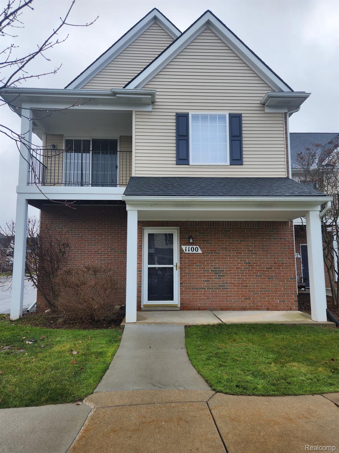 1100 Rial Lake Drive Howell, MI 48843 - Photo 1 of 19 Front facade.
