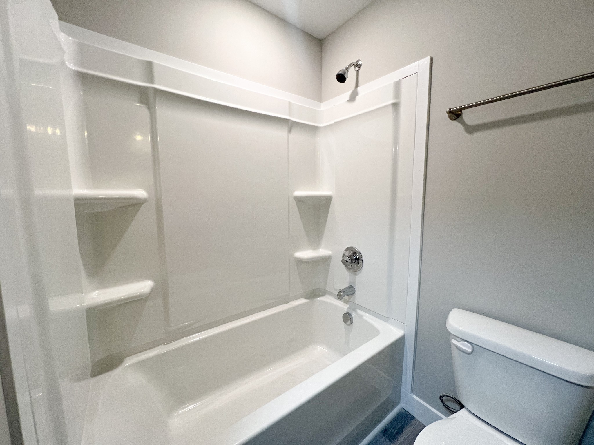 543 Peachers Mill Road, Unit 213 Clarksville, TN 37042 - Photo 20 of 21 a bathroom with a bathtub a toilet and a shower
