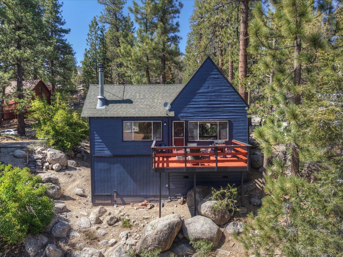 39187 Arapahoe Road Fawnskin, CA 92333 - Photo 5 of 33 a front view of a house with patio