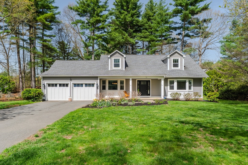 21 Shattuck Road Hadley, MA 01035 - Photo 1 of 42 a front view of a house with a garden