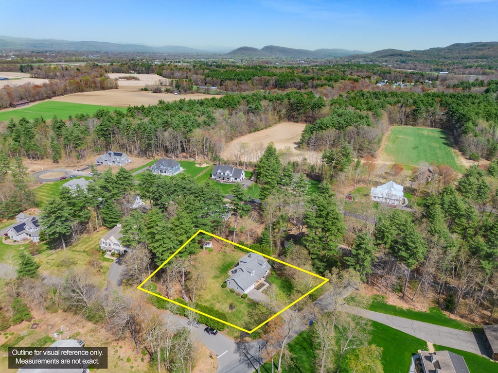 21 Shattuck Road Hadley, MA 01035 - Photo 12 of 42 a view of a lake with a mountain