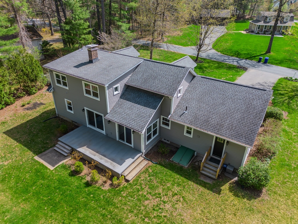 21 Shattuck Road Hadley, MA 01035 - Photo 14 of 42 an aerial view of a house with swimming pool and garden