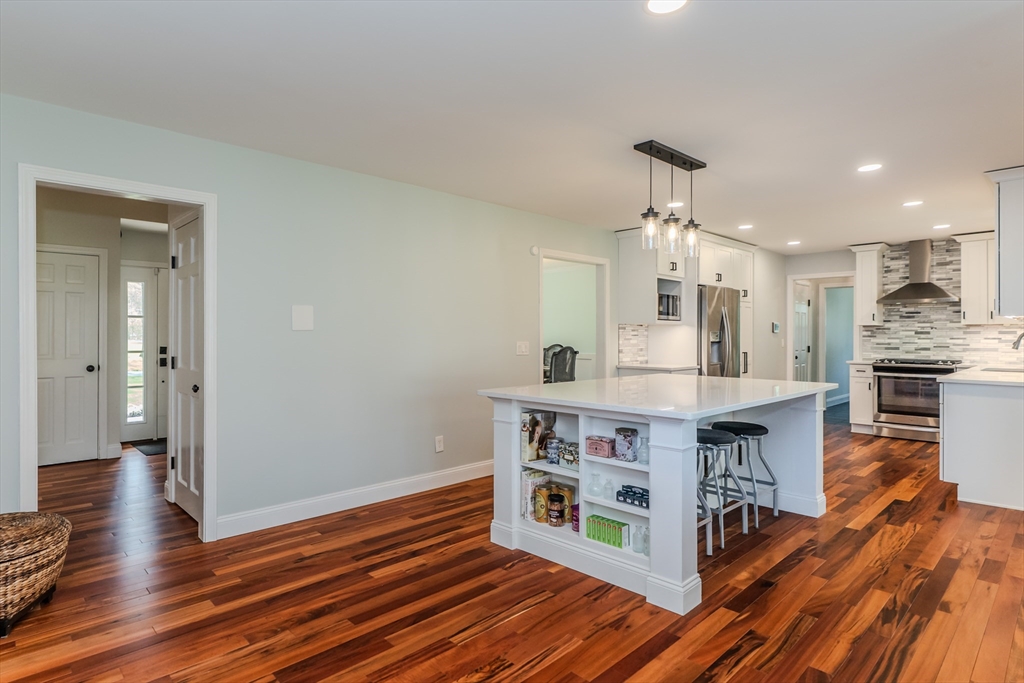 21 Shattuck Road Hadley, MA 01035 - Photo 21 of 42 a view of kitchen with cabinets and wooden floor
