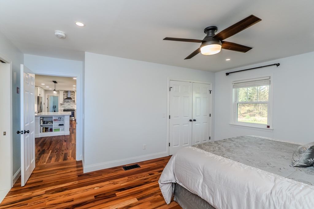 21 Shattuck Road Hadley, MA 01035 - Photo 33 of 42 a bedroom with a bed and a window