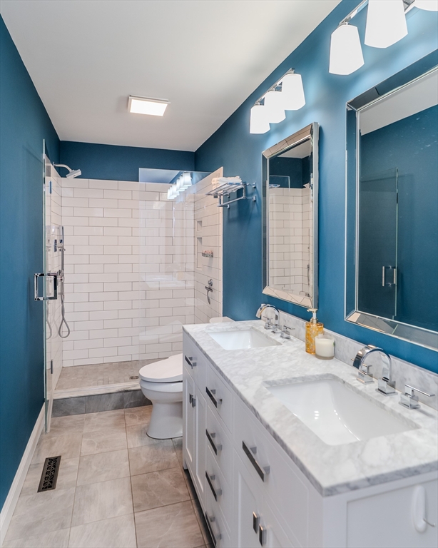 21 Shattuck Road Hadley, MA 01035 - Photo 34 of 42 a bathroom with a granite countertop sink toilet and shower