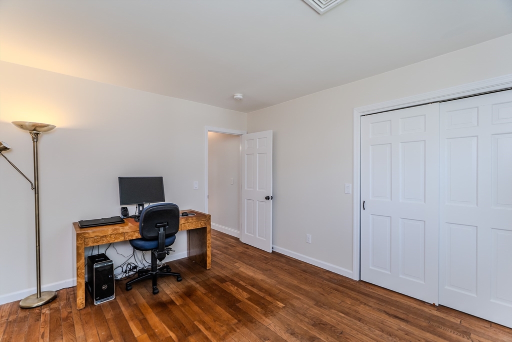 21 Shattuck Road Hadley, MA 01035 - Photo 39 of 42 a view of a workspace with furniture and wooden floor