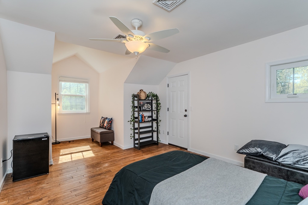21 Shattuck Road Hadley, MA 01035 - Photo 42 of 42 a bedroom with bed and wooden floor