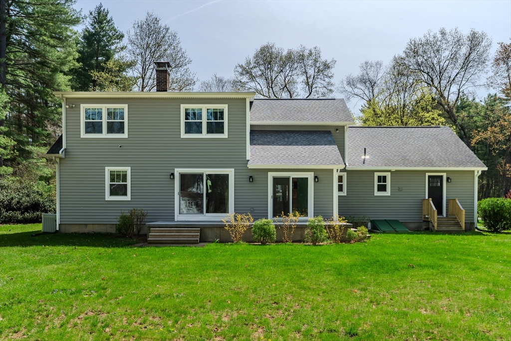 21 Shattuck Road Hadley, MA 01035 - Photo 6 of 42 a view of a house with a yard and plants
