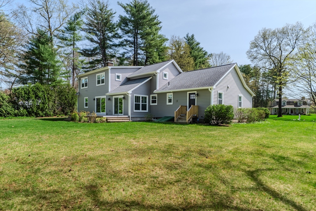 21 Shattuck Road Hadley, MA 01035 - Photo 8 of 42 a front view of a house with a garden