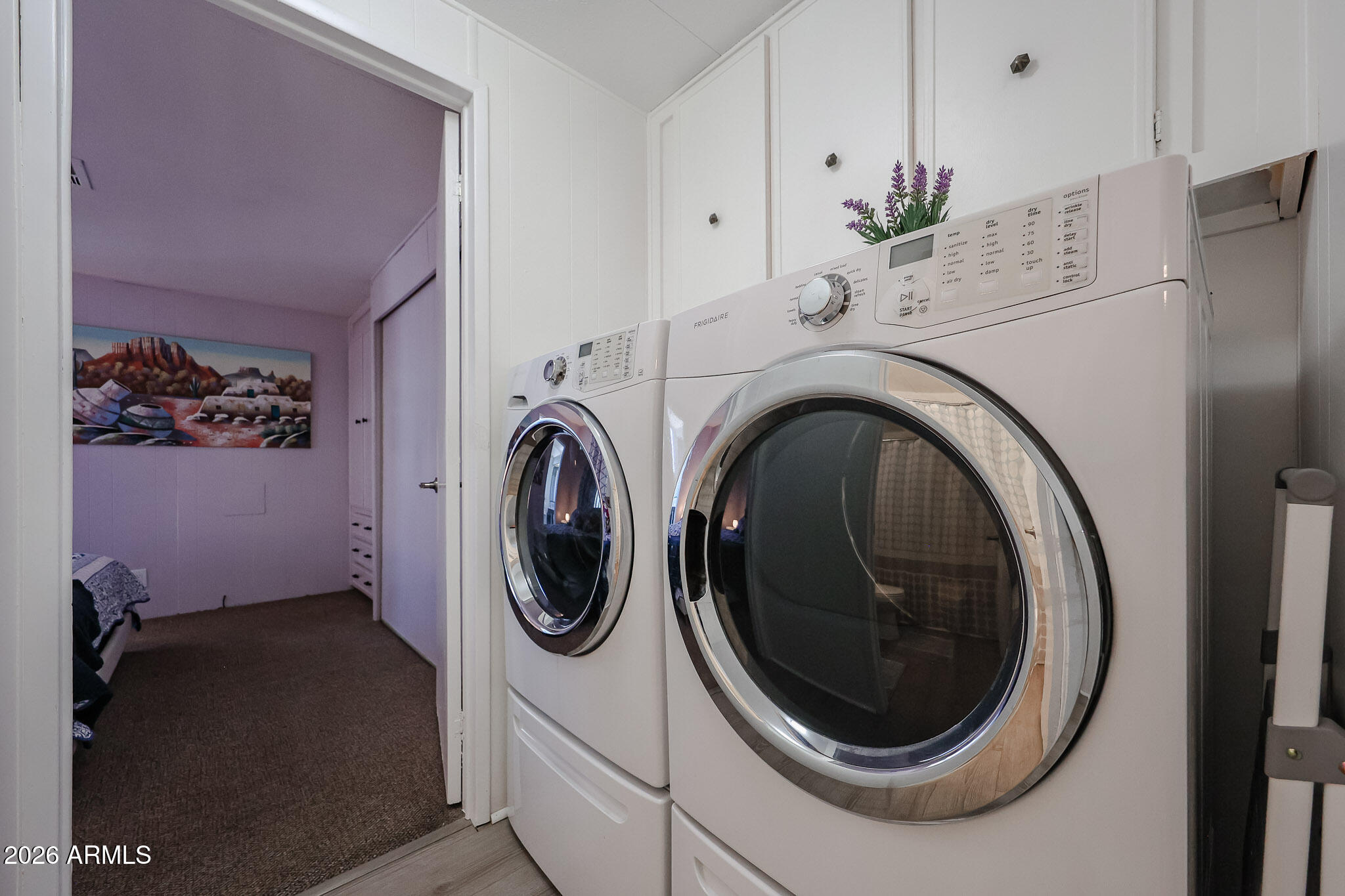 3104 East Broadway Road, Unit 216 Mesa, AZ 85204 - Photo 14 of 37 a utility room with dryer and washer