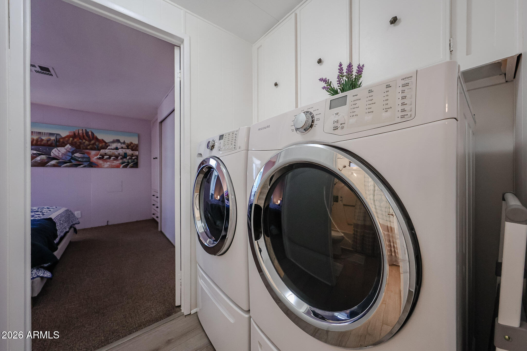 3104 East Broadway Road, Unit 216 Mesa, AZ 85204 - Photo 15 of 37 a utility room with dryer and washer